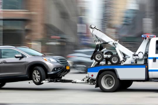 Vehicle towing and transport for impound services